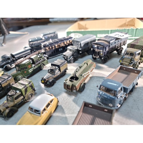 64 - Quantity of small military diecast vehicles by Oxford, inc 2x busses, 7x lorries, cars etc all in go... 