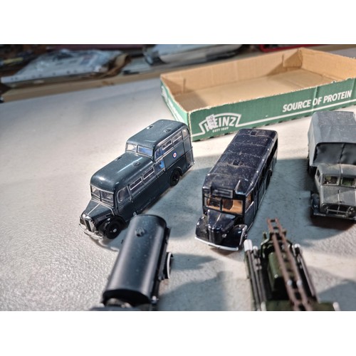 64 - Quantity of small military diecast vehicles by Oxford, inc 2x busses, 7x lorries, cars etc all in go... 