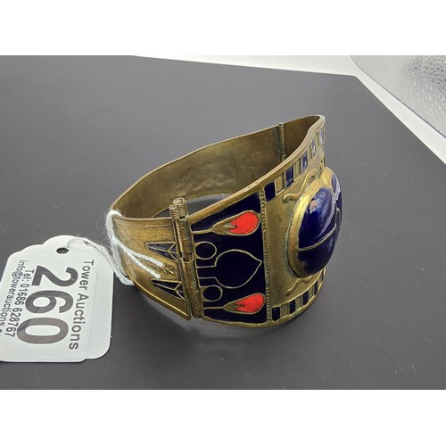 260 - A good quality rare vintage Egyptian revival brass and enamel hinged cuff bangle featuring a stunnin... 