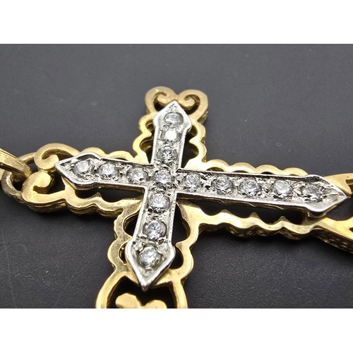 258 - An ornate pretty hallmarked 9ct yellow old Cross pendant inset with a quantity of sparkly crystal st... 