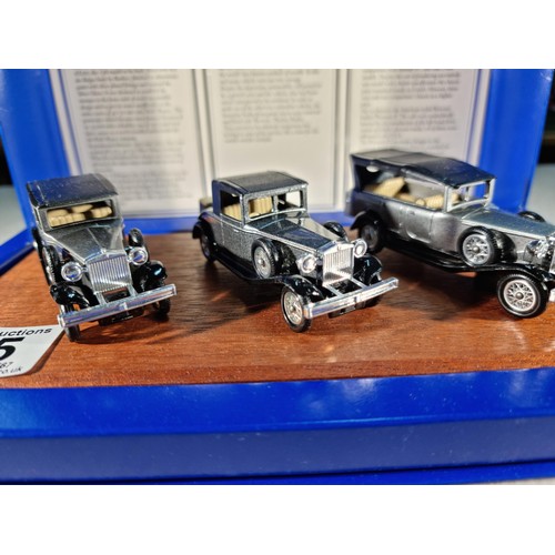 85 - Boxed Lledo Rolls-Royce diecast car collection on a wooden plinth inc a Silver Ghost, Playboy and a ... 