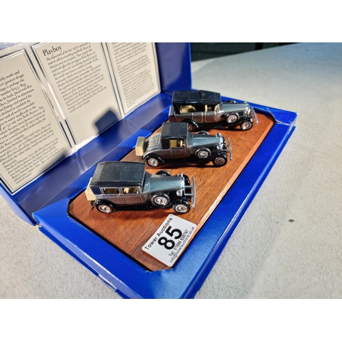 85 - Boxed Lledo Rolls-Royce diecast car collection on a wooden plinth inc a Silver Ghost, Playboy and a ... 