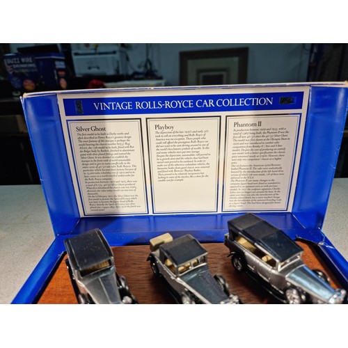 85 - Boxed Lledo Rolls-Royce diecast car collection on a wooden plinth inc a Silver Ghost, Playboy and a ... 