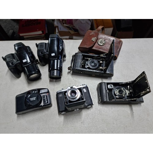 90 - Collection of 6x cameras inc an Olympus IS-1000, Olympus Superzoom 700XB, Zeiss Ikon Nettar camera w... 