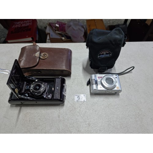 92 - Cased Soho Cadet folding camera along with a Lumix Mega O.I.S. 5.0 mega pixel camera in case