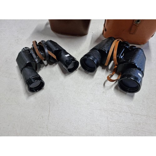 93 - 2x pairs of cased binoculars inc a pair of Wray London and a pair of 10x50 Yamatar field view AT bot... 