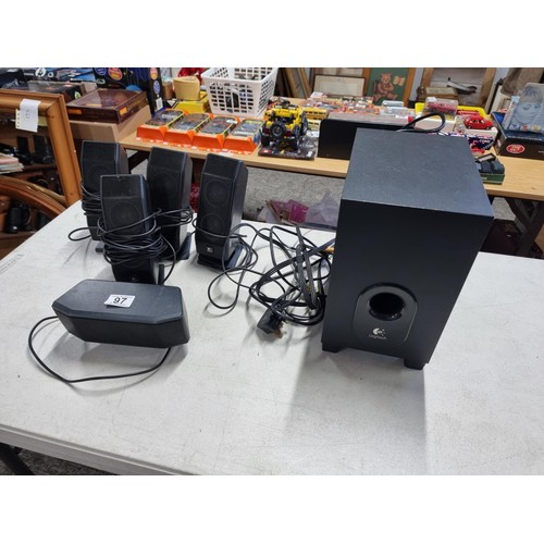 97 - A computer Logitech surround system consisting of 5x speakers and subwoofer