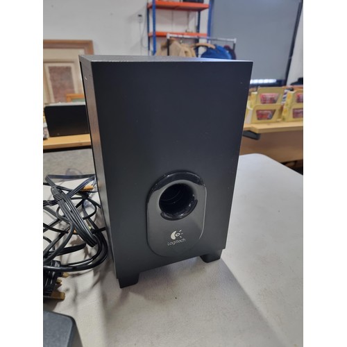 97 - A computer Logitech surround system consisting of 5x speakers and subwoofer