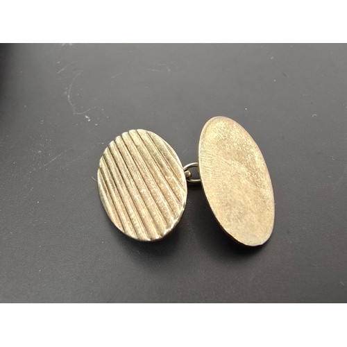 243 - A pair of vintage hallmarked silver cufflinks with an attractive ribbed design fitted in its origina... 