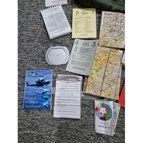 111 - A bag containing a large qty of maps, booklet on familiarization of the cockpit, all relating to the... 