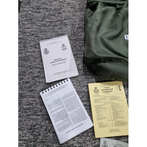 111 - A bag containing a large qty of maps, booklet on familiarization of the cockpit, all relating to the... 