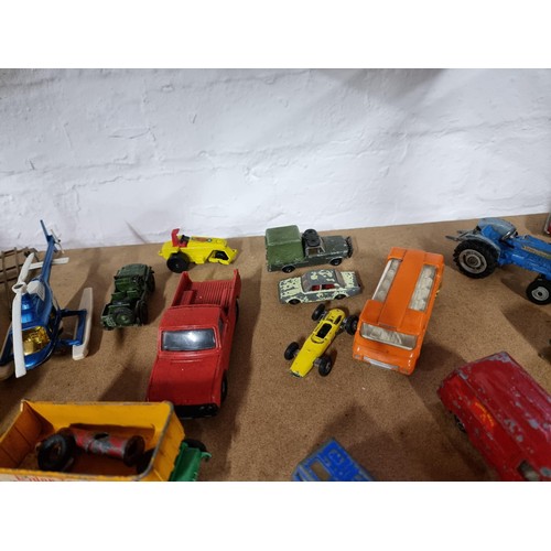 118 - Large quanity of play worn vehicles including Batman, ESSO oil tanker, London Taxi, hauliers lorry, ... 