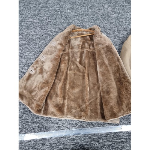 121 - 3x good quality winter coats including 2x sheepskin coats, woollen camel coat. One of the coats is m... 