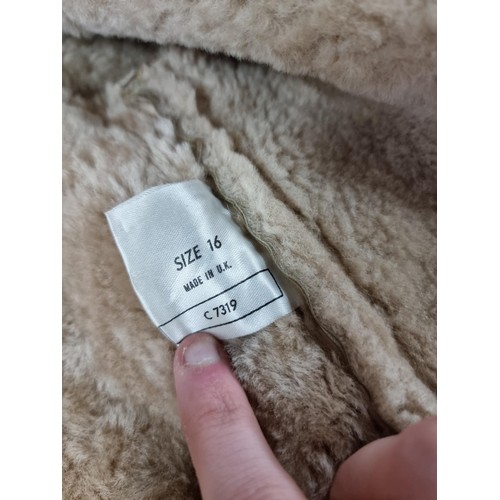 121 - 3x good quality winter coats including 2x sheepskin coats, woollen camel coat. One of the coats is m... 