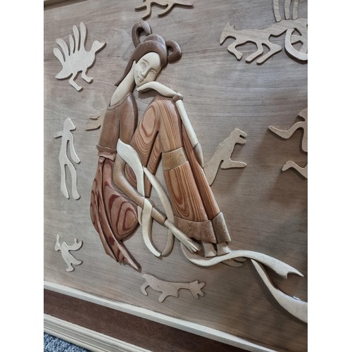 130 - Good quality framed wooden 3D picture of an oriental lady made of hand carved pieces of wood with su... 