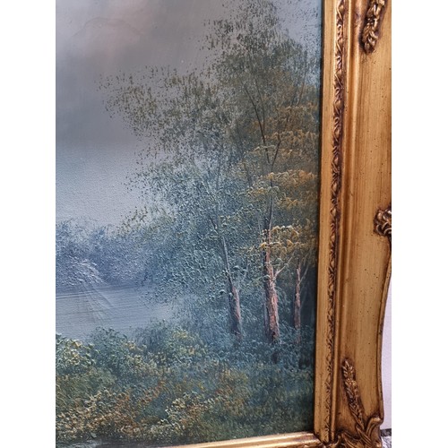 138 - Ornate gilt framed oil on canvas painting of a wooded lake scene inc good order signed lower left Gi... 