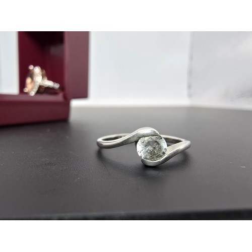 176 - Pretty 925 silver solitaire ring inset with a sparkly CZ stone, along with a new ornate rose gold to... 