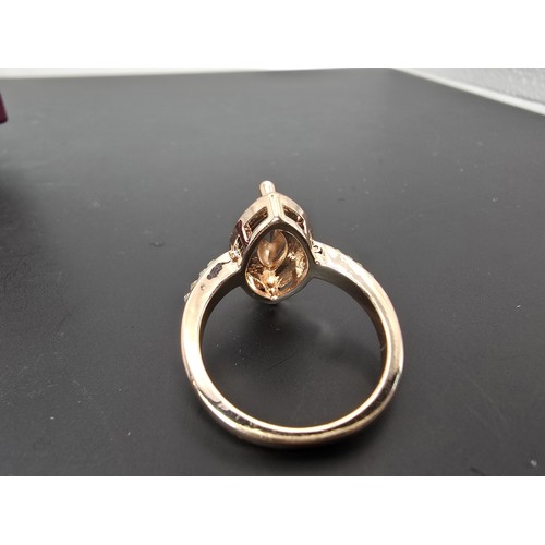 176 - Pretty 925 silver solitaire ring inset with a sparkly CZ stone, along with a new ornate rose gold to... 