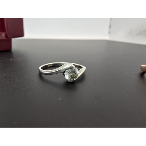 176 - Pretty 925 silver solitaire ring inset with a sparkly CZ stone, along with a new ornate rose gold to... 