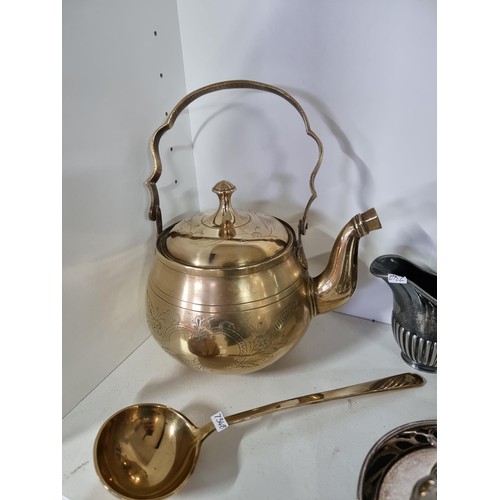 9 - A quantity of collectables including a good quality Victorian copper kettle, a silver plated water j... 