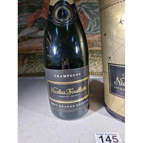 145 - New and sealed bottle of Nicolas Feuillatte Champagne set in a metal champagne bottle with a foam to... 