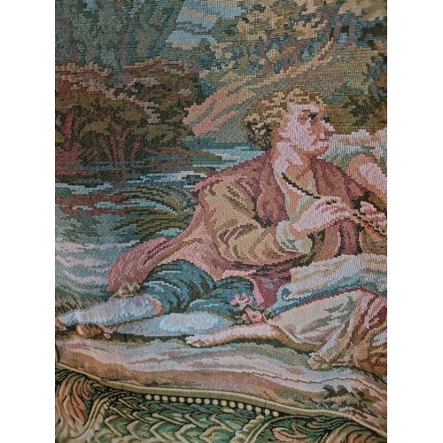 140 - Good quality wall hanging tapestry of a lovers scene in good order with a leaf decoration border, me... 