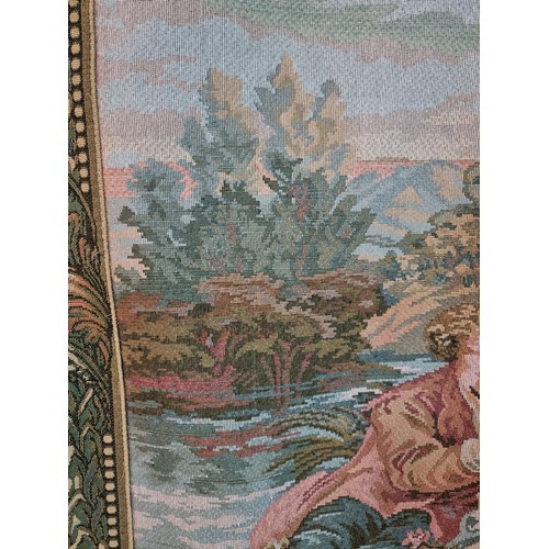 140 - Good quality wall hanging tapestry of a lovers scene in good order with a leaf decoration border, me... 