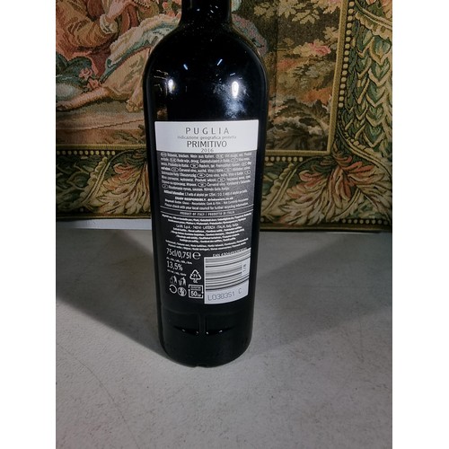 146 - Bottle of 75cl Primitivo Puglia red wine, bottle has had the top seal removed but hasn't been opened