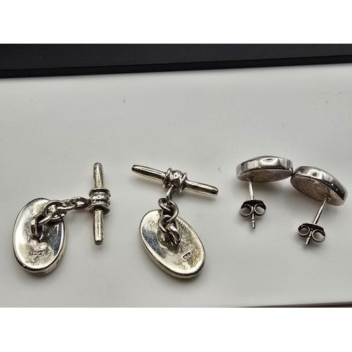 180 - A pretty matching 925 silver ladies jewellery set to include a pair of ladies silver cufflinks inset... 