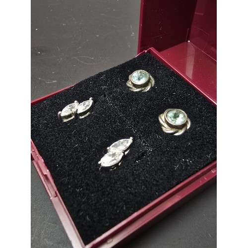 182 - 2 pairs of pretty 925 silver stud earrings to include a good vintage pair inset with faceted blue to... 