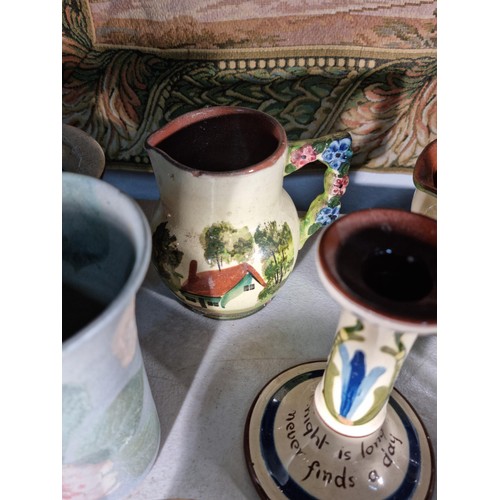 152 - Shelf full of collectable inc a quantity of Torquay ware inc candlesticks, jug and bowl along with h... 