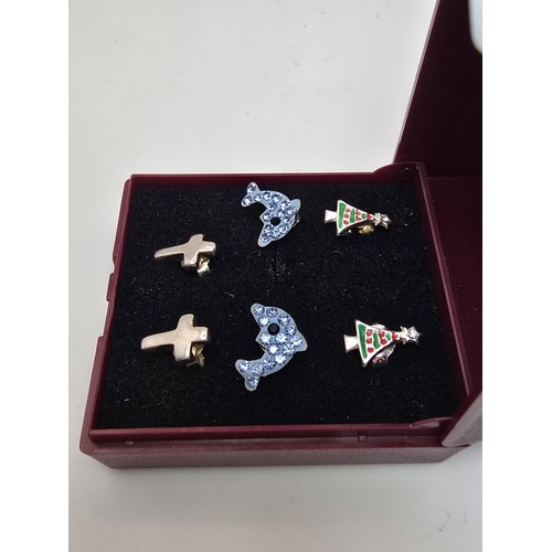 187 - A bundle of 3 pairs of 925 silver stud earrings to include a Cross pair, a dolphin pair and a Christ... 