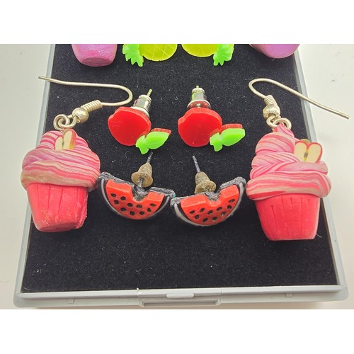 190 - A bundle of 6 pairs of novelty costume earrings to include pairs relating to cupcakes, M&M's, fruit ... 