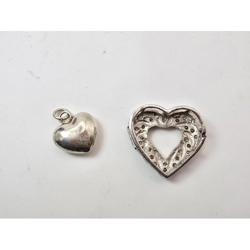 198 - 2x heart formed 925 silver pendants, 1 is of a solid heart design the other is of a pierced design, ... 