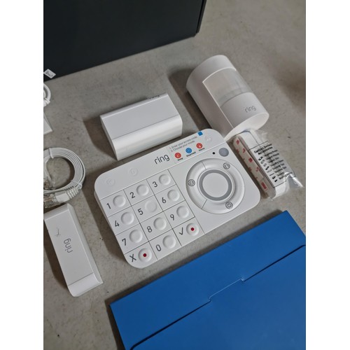 154 - Boxed Ring alarm system with key pad, sensor speaker and connection cables etc please see pictures f... 