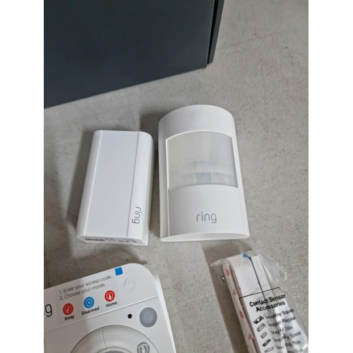 154 - Boxed Ring alarm system with key pad, sensor speaker and connection cables etc please see pictures f... 