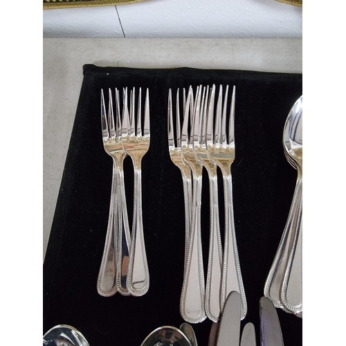 155 - A Viners cutlery set, 6 person and complete,  including 2x large silver plated serving spoons, comes... 