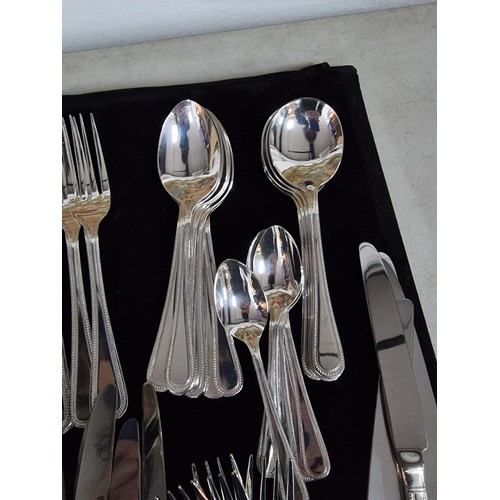 155 - A Viners cutlery set, 6 person and complete,  including 2x large silver plated serving spoons, comes... 