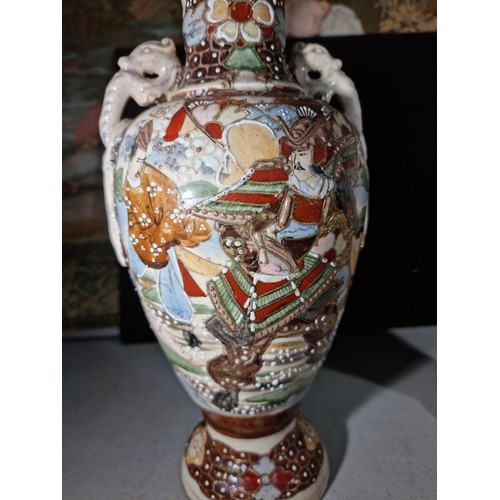 157 - Pair of hand painted oriental vases with a warrior to the front, with seahorse style handles to the ... 