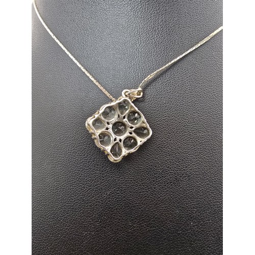 203 - A pretty 925 silver cluster pendant inset with faceted rock crystal gemstones (quartz) on a 16