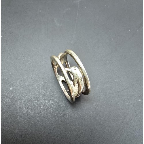 206 - 2x chunky 925 silver rings, both having a dolphin design, the pierced ring is size K, the other ring... 