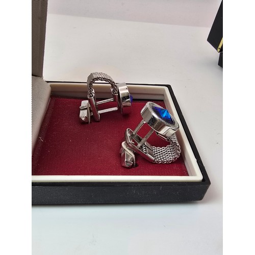 202 - 2 cased attractive pairs of gents cufflinks from Mallorca featuring a silver tone pear inset with bl... 