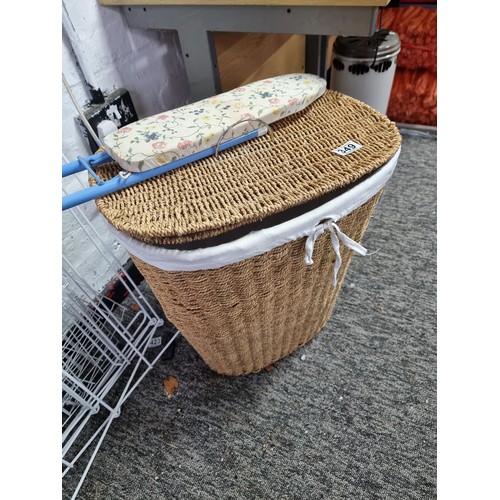 325 - Good quality lined linen basket along with an ironing board, clothes airer and a sleeve ironing boar... 