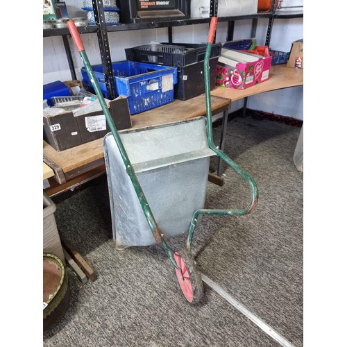 322 - Good quality aluminium wheel barrow with a solid wheel in good overall condition has a height of 52c... 