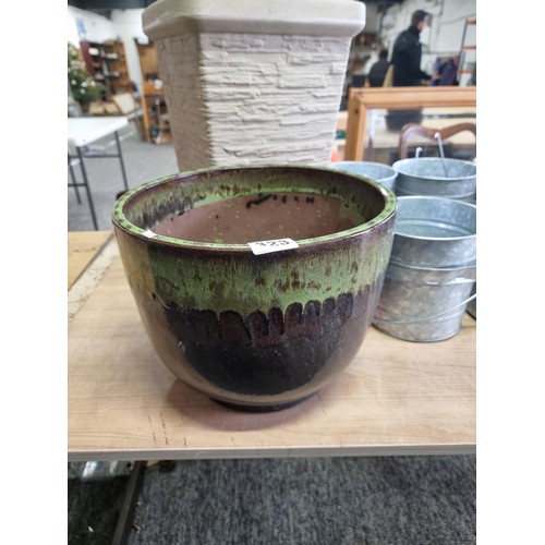 323 - Quantity of planters inc a blue glaze stoneware planter, green drip glaze stone planter, tall plasti... 