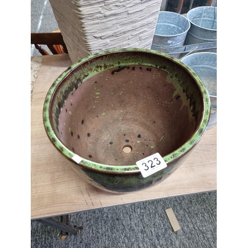 323 - Quantity of planters inc a blue glaze stoneware planter, green drip glaze stone planter, tall plasti... 