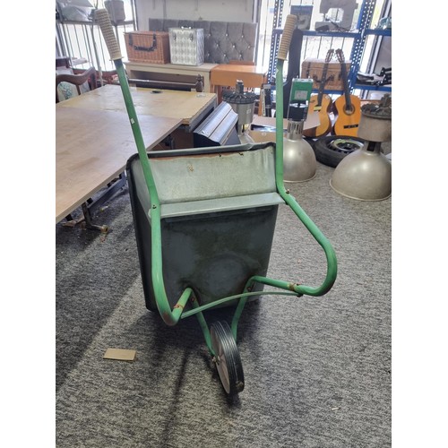 324 - Good quality aluminium wheel barrow with a solid wheel in good overall condition has a height of 52c... 