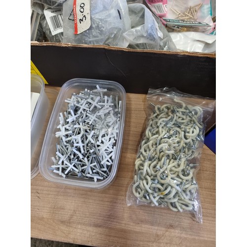 329 - Box containing a quantity of as new boxes and bags of hooks, nails, tack pins screws etc