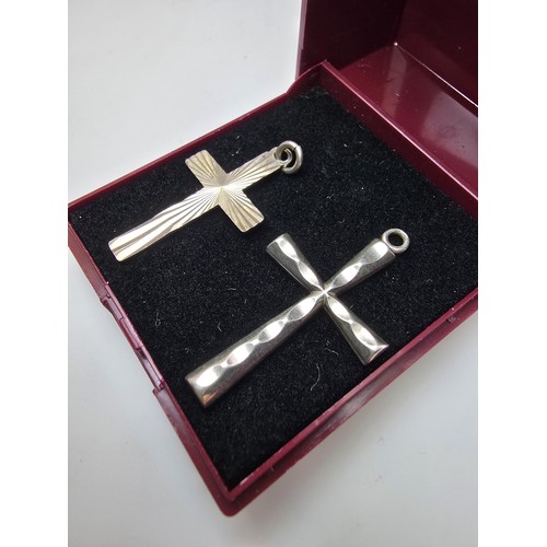 207 - 2x 925 sterling silver Cross formed pendants with different designs, in clean condition and boxed. L... 