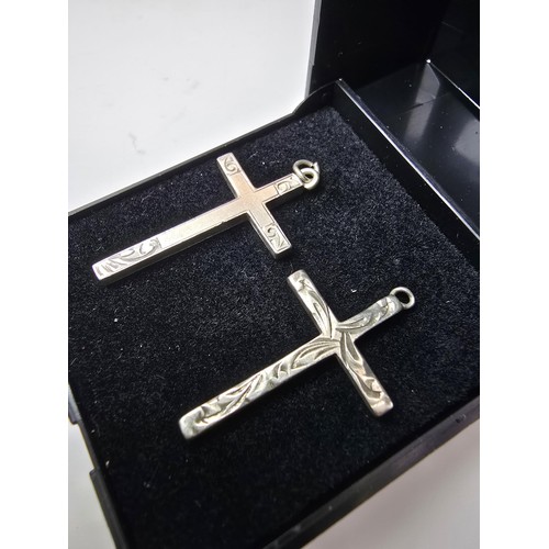 208 - 2x 925 sterling silver Cross formed pendants with different designs, in clean condition and boxed. L... 